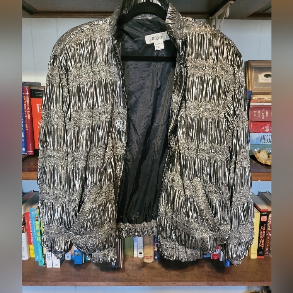 Retro metallic silver jacket with shoulder pads. Women's large